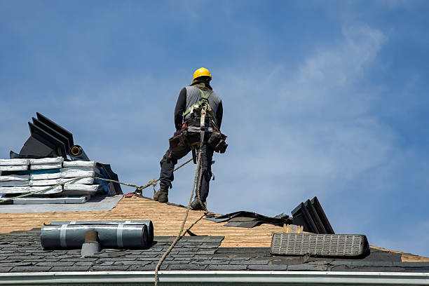 Professional Roof Replacement technician working in Newfield, NJ
